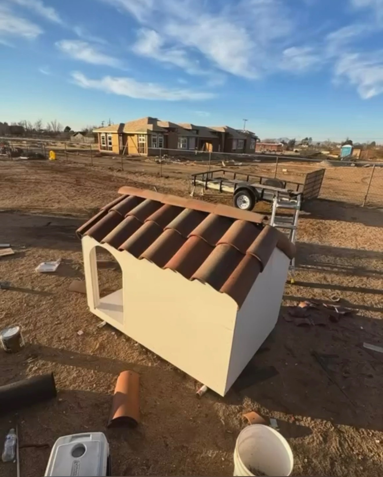 Custom kennel — tile roof build — supplied before-and-after comparison